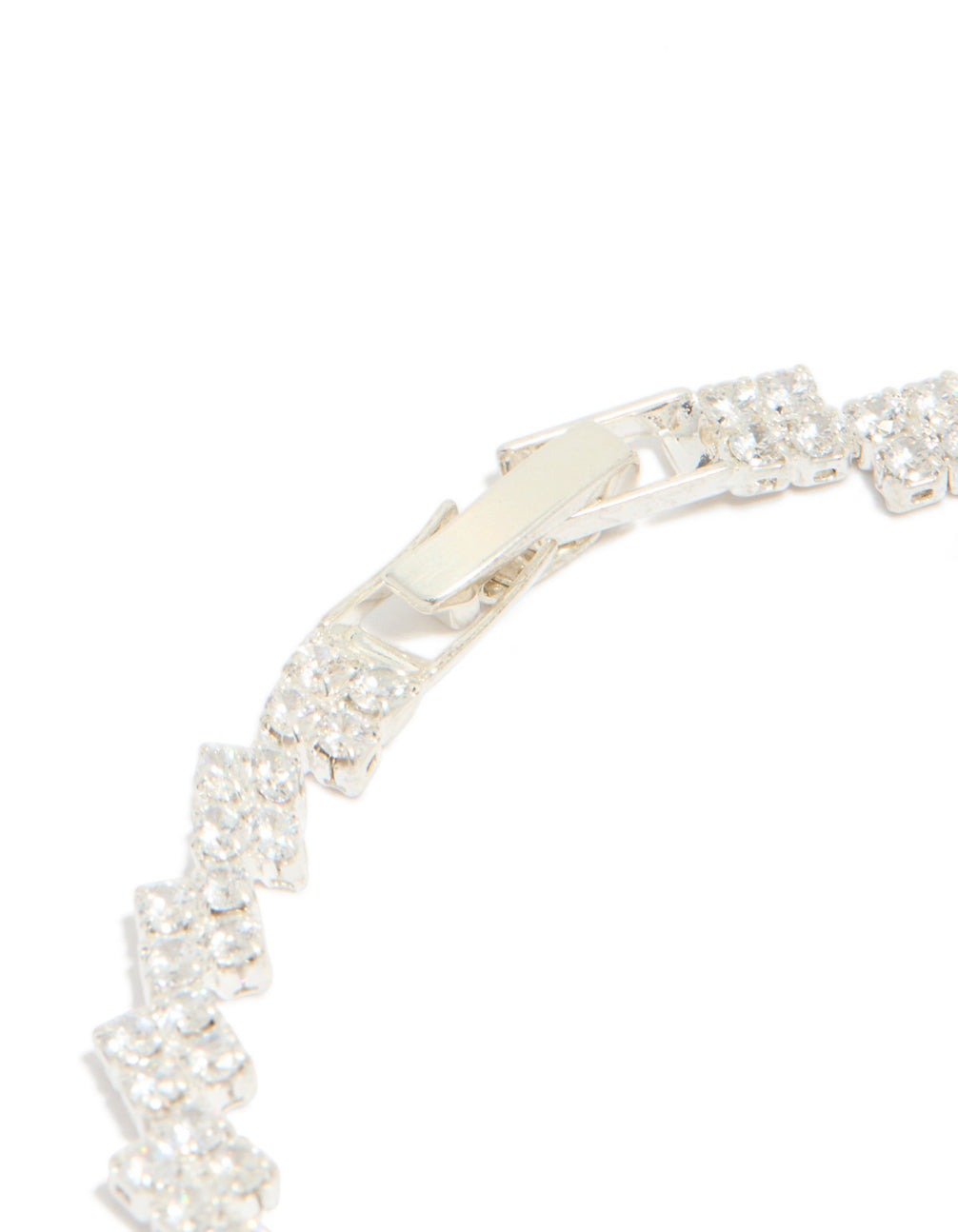 Featuring silver plated cubic zirconia multi flower tennis bracelet with floral pattern closure detail view