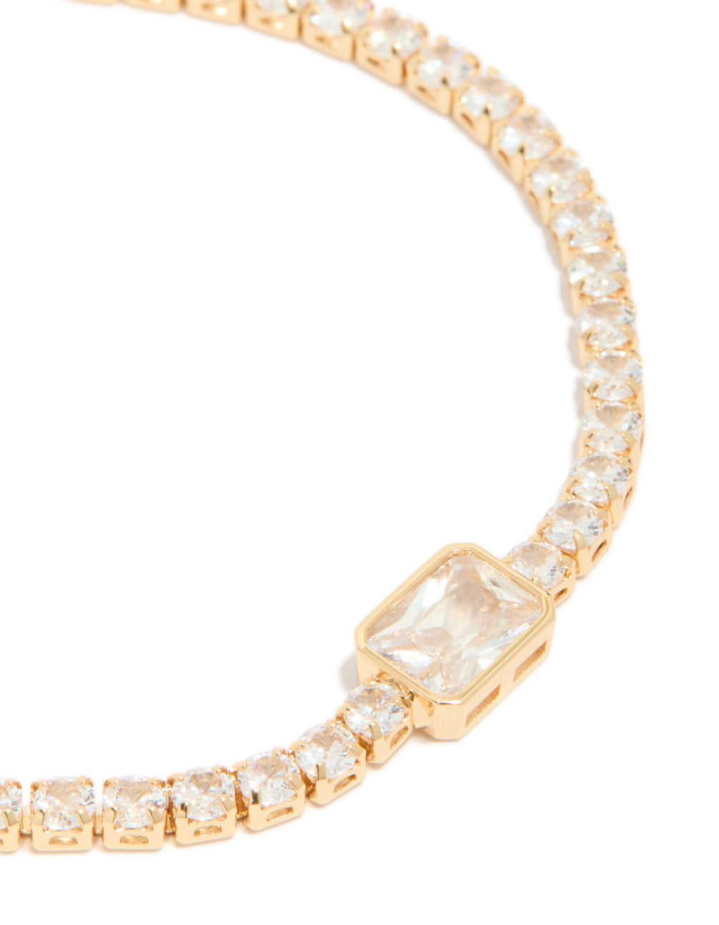 Detailed view of gold plated cubic zirconia rectangle tennis bracelet highlighting stone settings in close up view