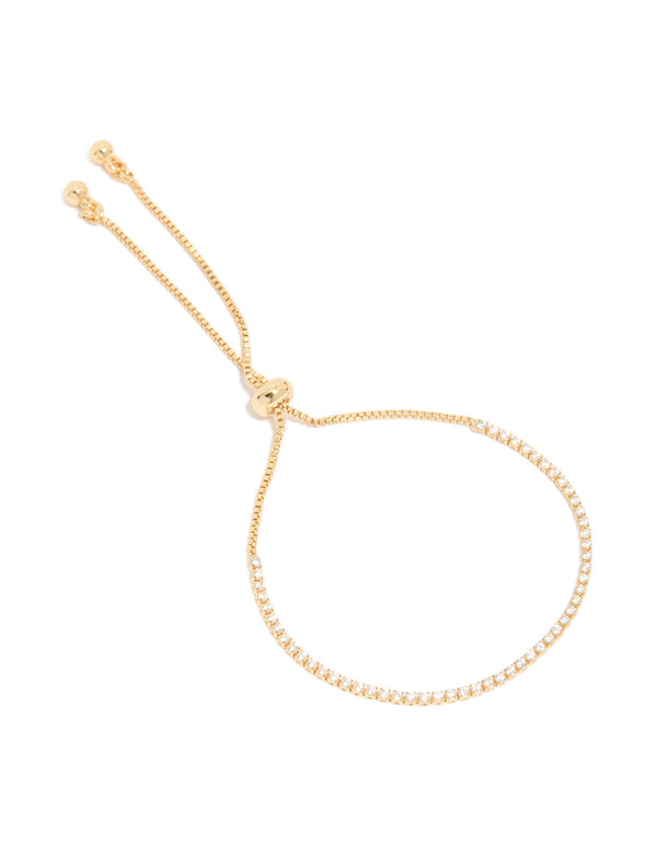 Featuring a dainty gold plated cubic zirconia mini tennis toggle bracelet front view
