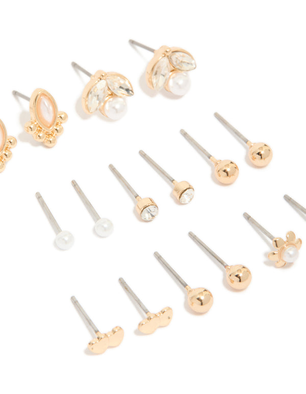 Crafted from gold diamante and pearl stud earrings in an 8-pack with ball and floral accents featuring oval stone close up view
