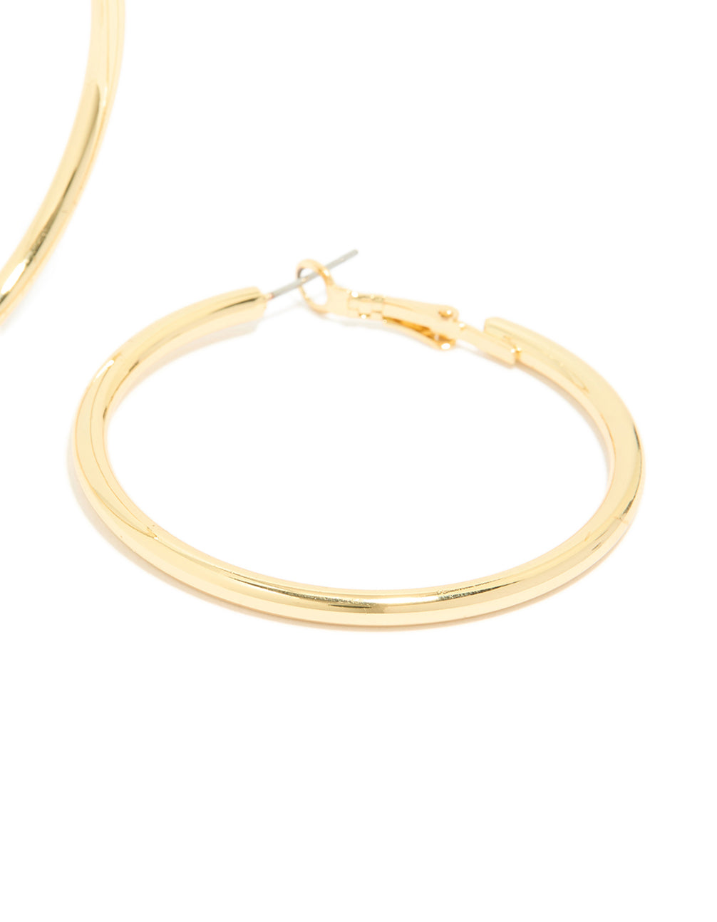 Designed with gold plating, these thick hoop earrings feature statement and chunky style post detail view
