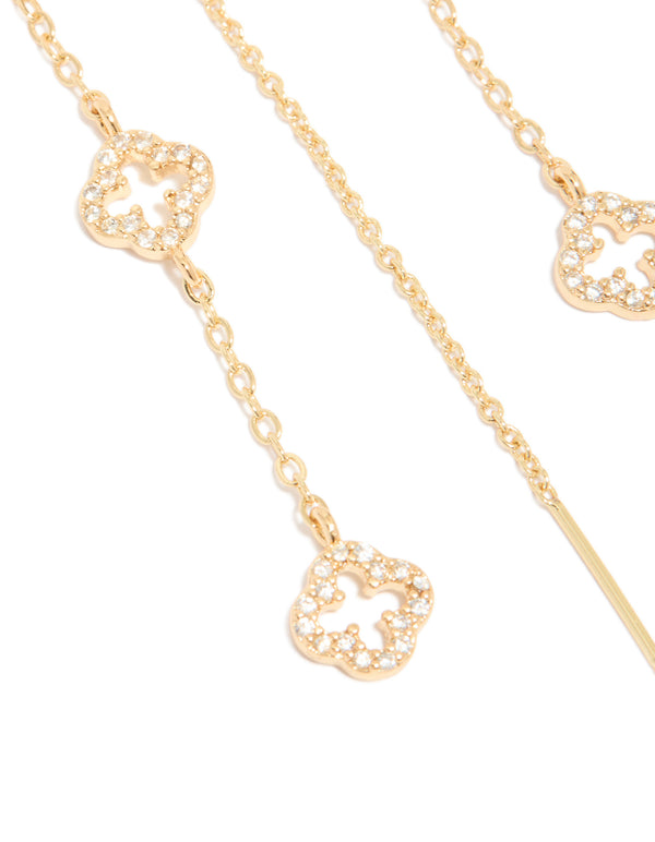 Stunning gold plated thread through earrings display cubic zirconia flower design in close up view