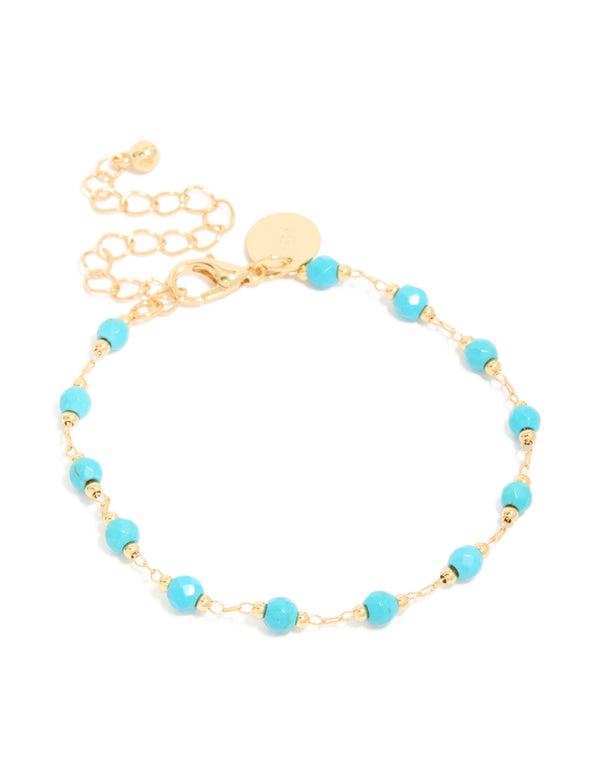 Elegant gold plated turquoise semi precious stone bracelet featuring front view