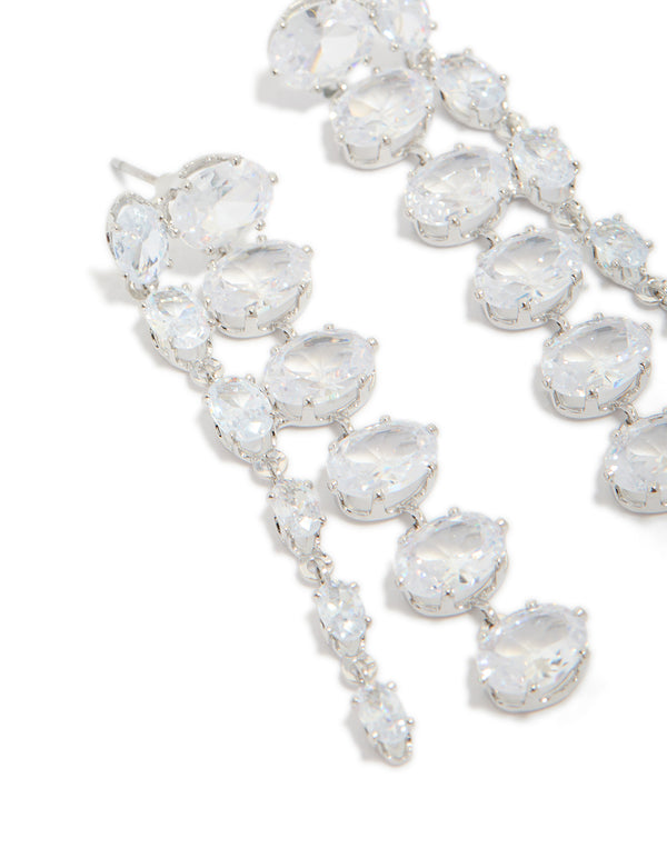 Captivating silver cubic zirconia oval layered drop earrings with light cyan close up view
