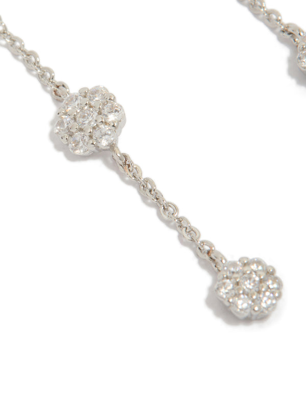 Beautifully detailed silver cubic zirconia mini floral drop earrings highlighting flower cluster and chain craftsmanship close up view