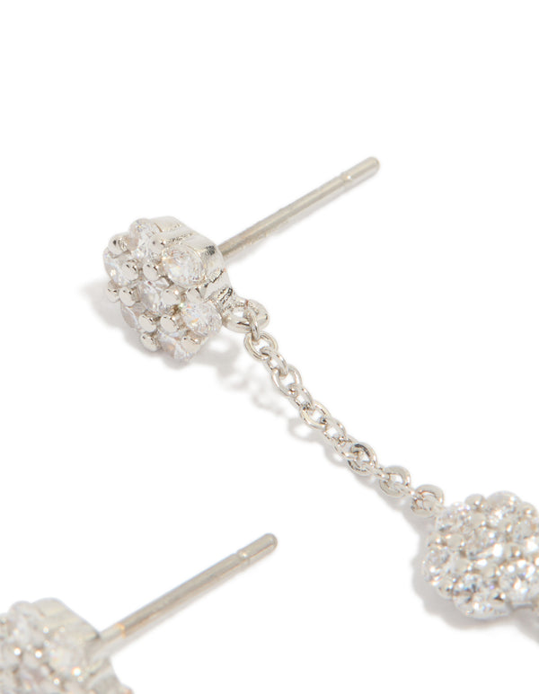 Designed silver cubic zirconia mini floral drop earrings revealing post fastening mechanism and flower detail post detail view