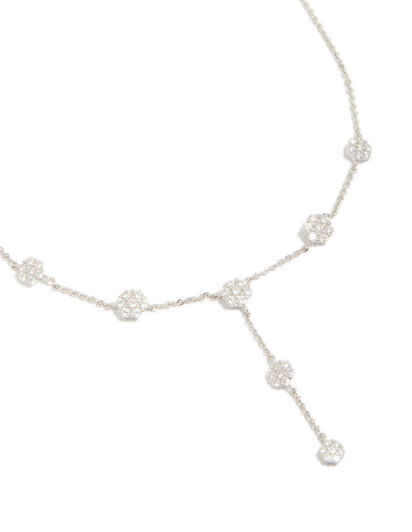 Beautifully crafted cubic zirconia mini floral y necklace in dainty silver close up view