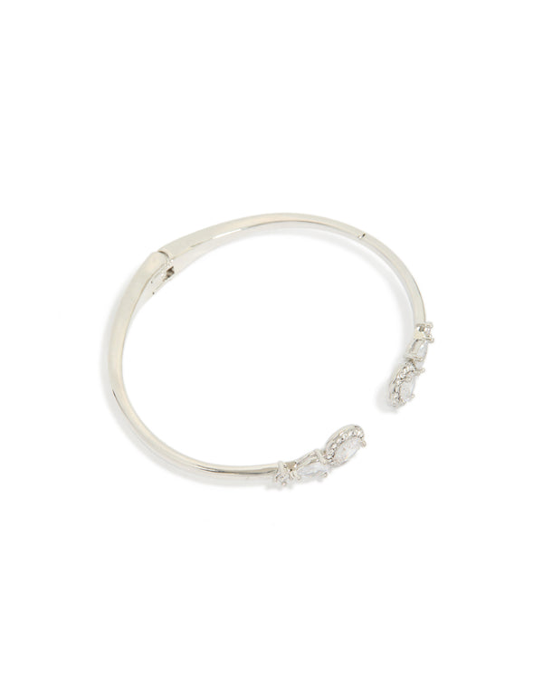 Showcasing a silver cubic zirconia circle hinged bangle front view