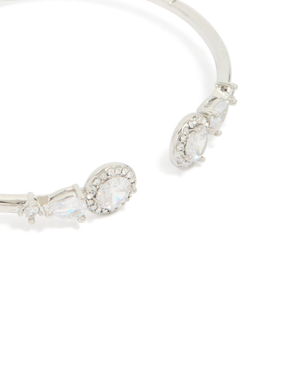 Elegantly crafted silver cubic zirconia circle hinged bangle with embellishment details, close up view