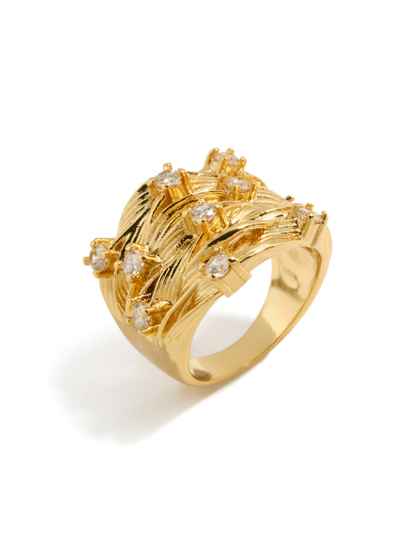 Crafted from gold plated material, this chunky lined statement ring in side detail view