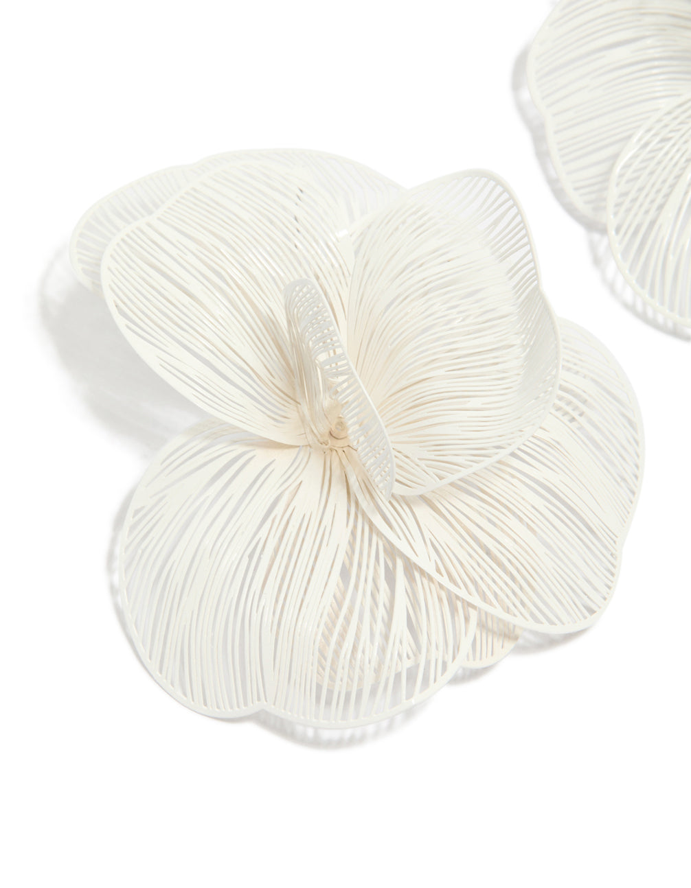 Designed with white coated metal full flower stud earrings featuring floral pattern in ivory close up view