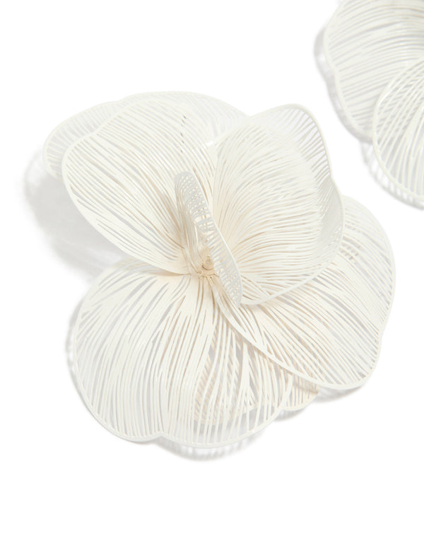 Designed with white coated metal full flower stud earrings featuring floral pattern in ivory close up view