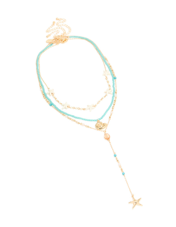 This gold blue beaded layered Y-necklace with shell and starfish showcases ocean features close up view