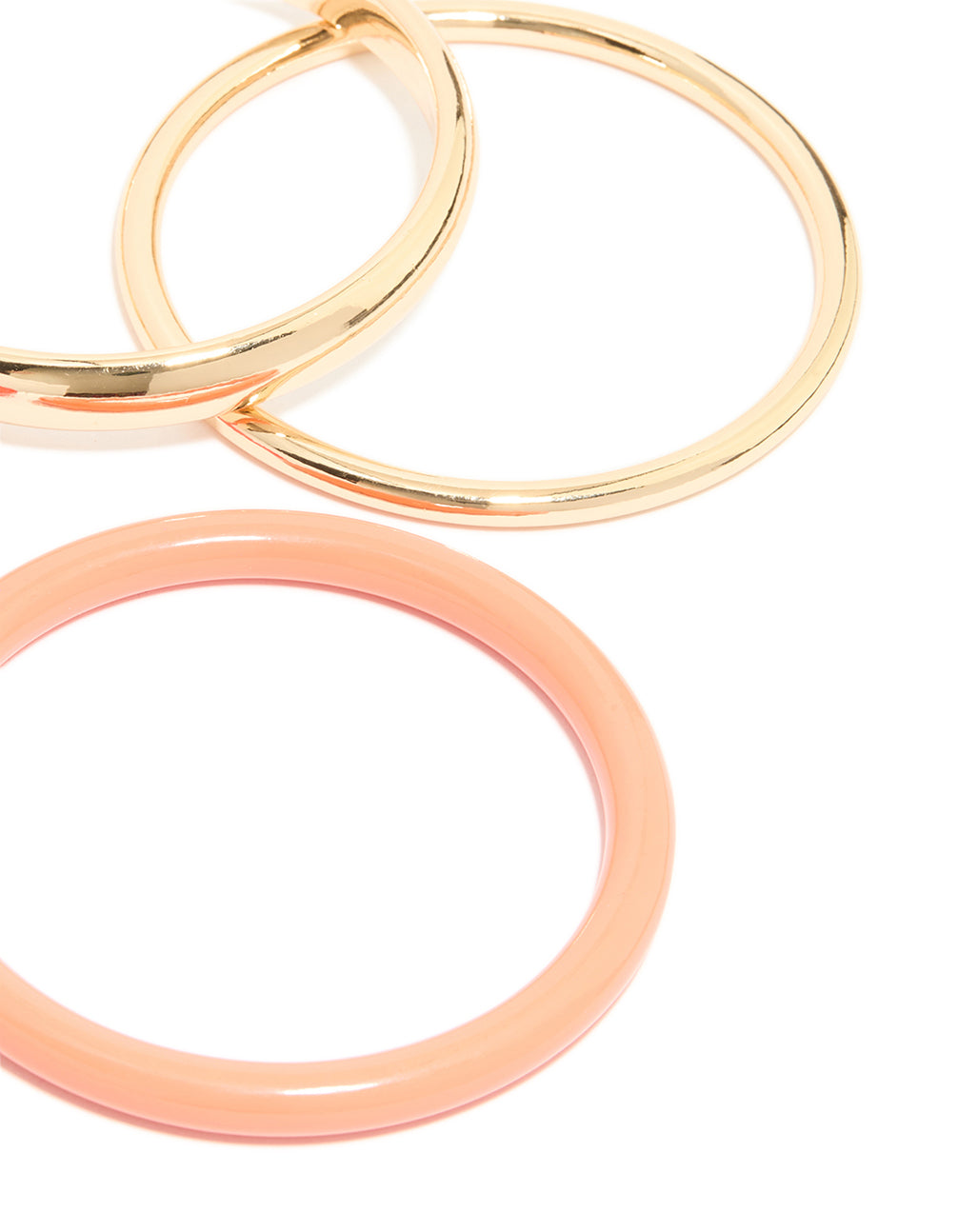 Showcasing acrylic coral thin bangles with marble pattern and gold accents in a 4-pack set close up view