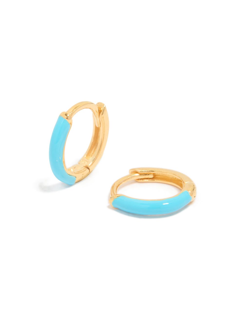 Showcasing gold plated sterling silver light blue enamel huggie earrings with turquoise accents, front view