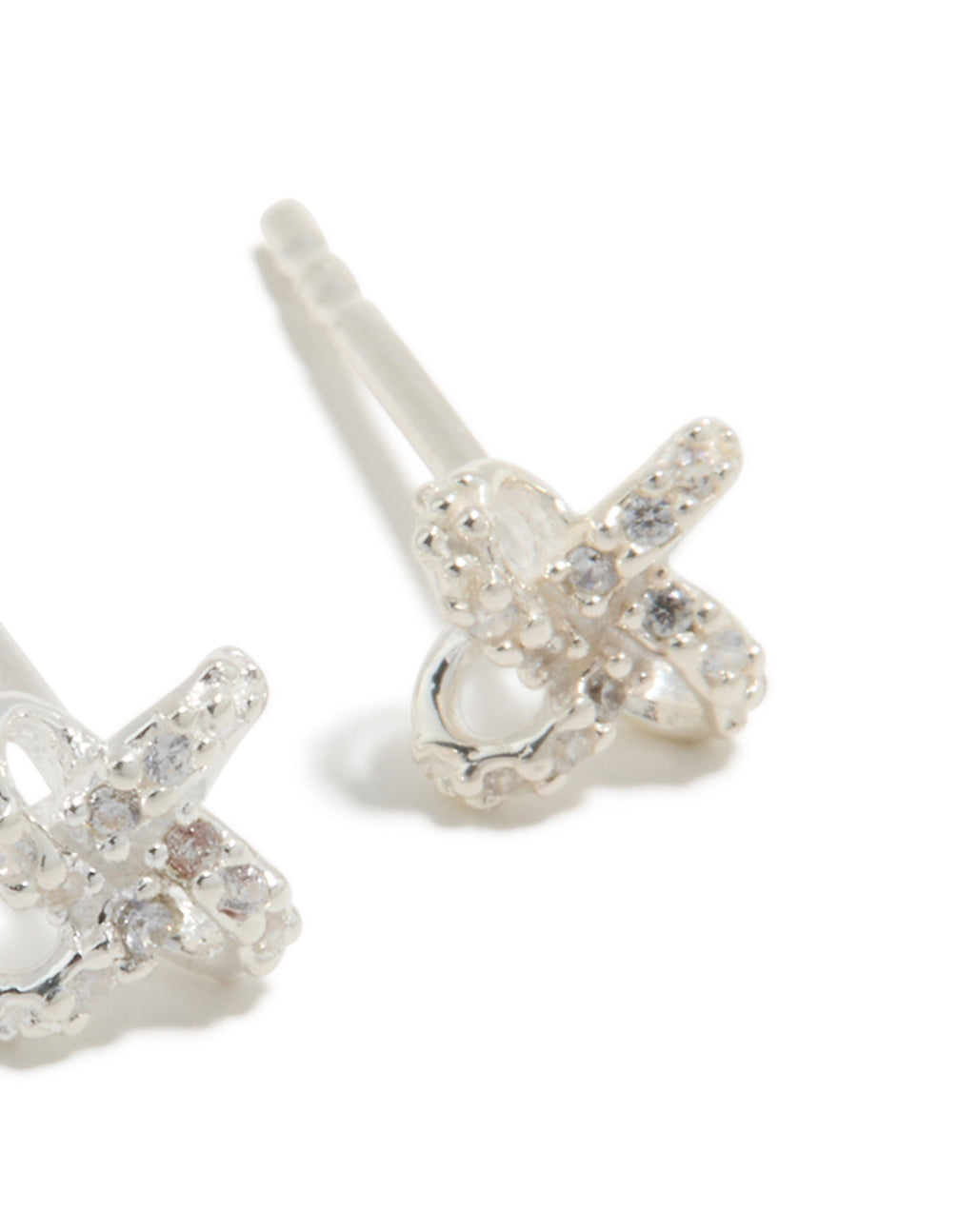 Displaying sterling silver cubic zirconia knot stud earrings with clear accents in a post detail view