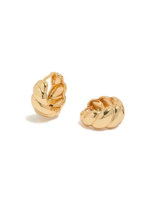 Showcasing gold plated brass croissant hoop earrings in a polished finish front view
