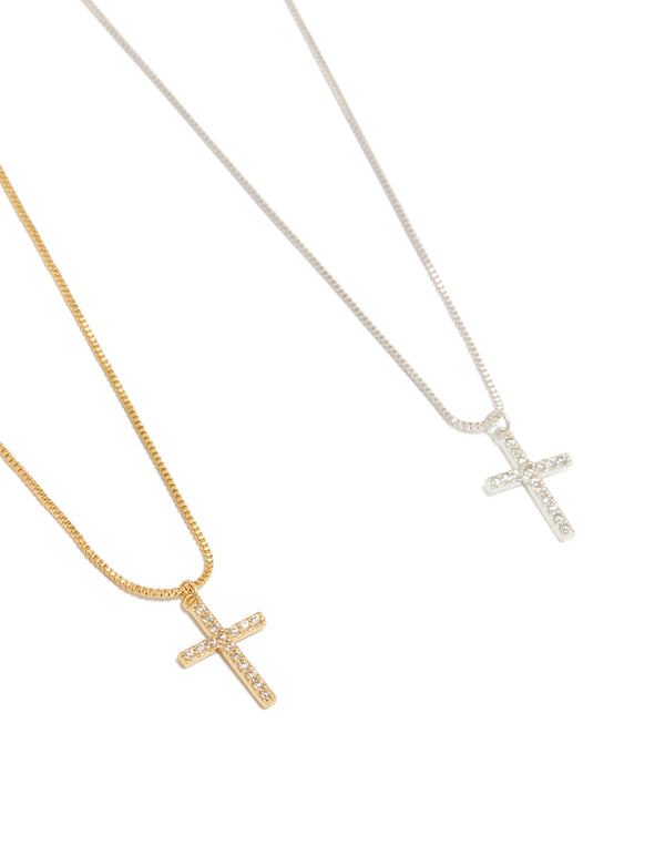 Discover mixed metal cubic zirconia cross pendant necklaces in a 2-pack with gold and silver plating close up view