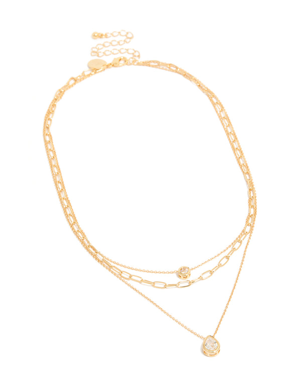 Featuring a gold plated cubic zirconia bezel triple layered chain necklace dainty styling in front view