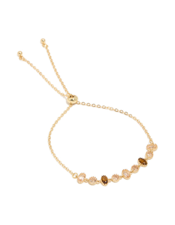 Showcasing a gold plated bracelet with cubic zirconia oval and round stone front view