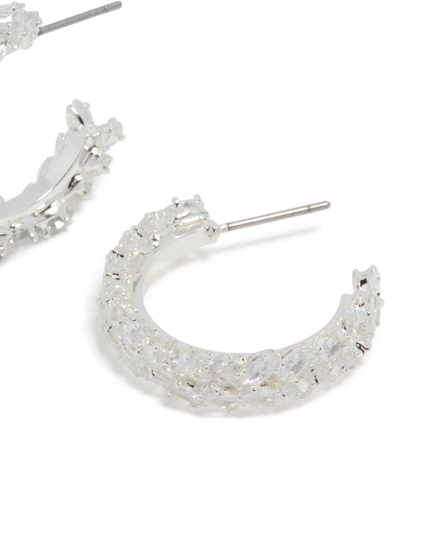 Featuring silver plated medium leaf hoop earrings with cubic zirconia post detail view
