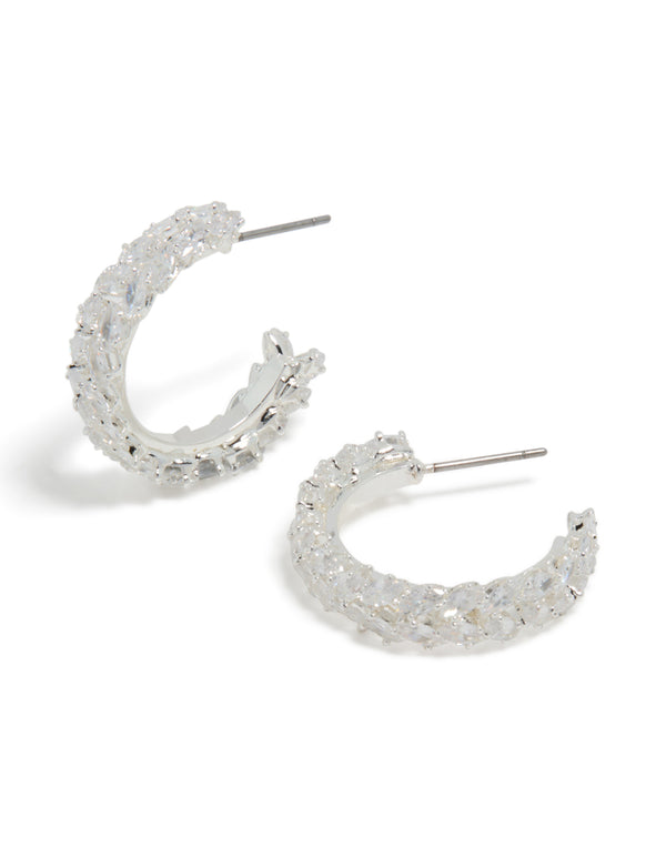 Showcasing silver plated medium leaf hoop earrings featuring cubic zirconia front view