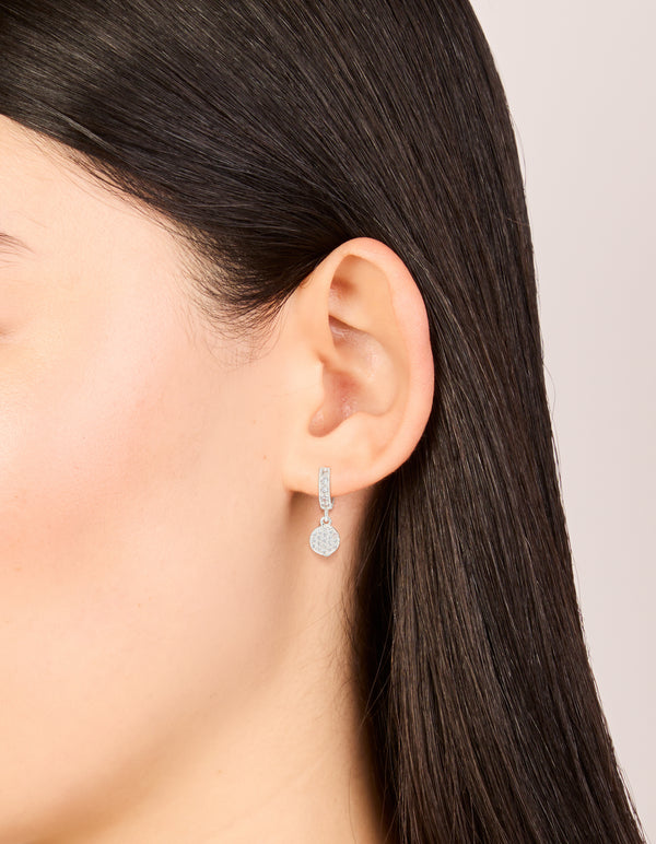 Elegant silver plated cubic zirconia pavé circle drop earrings on ear view