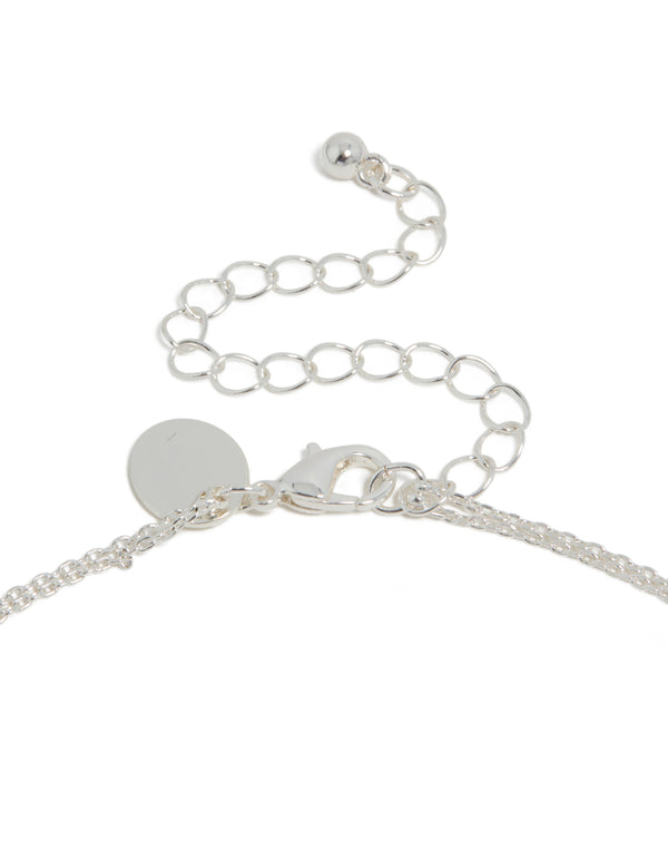 Displaying a silver plated cubic zirconia double layered heart pendant necklace clasp detail view