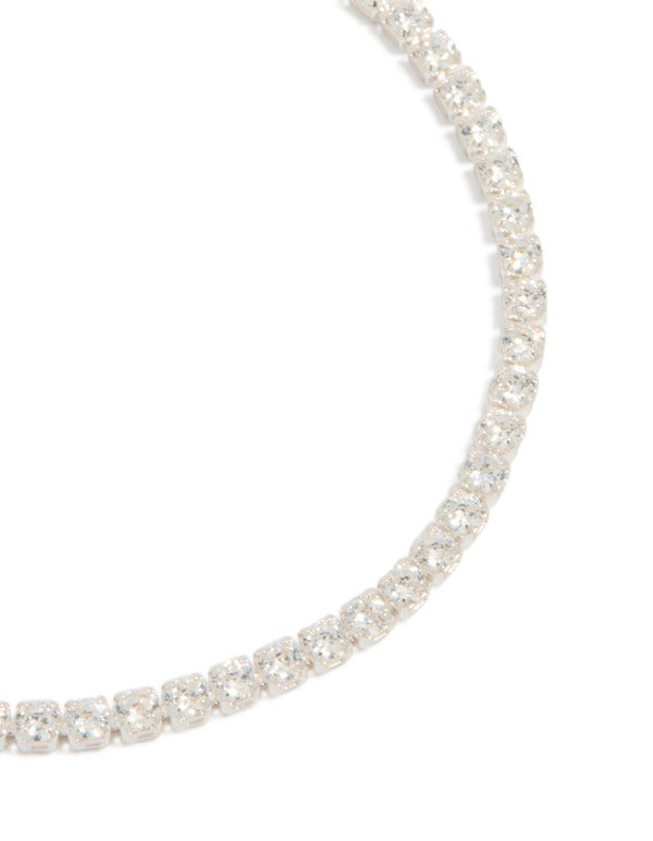 Crafted from silver plated material, this cubic zirconia small square tennis bracelet features glitter embellishments close up view