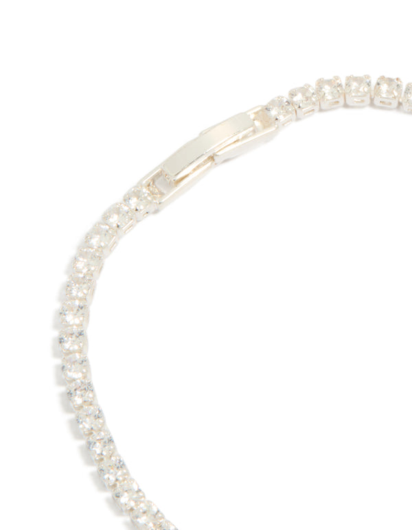 Designed with silver plated cubic zirconia small square tennis bracelet featuring glitter closure detail view