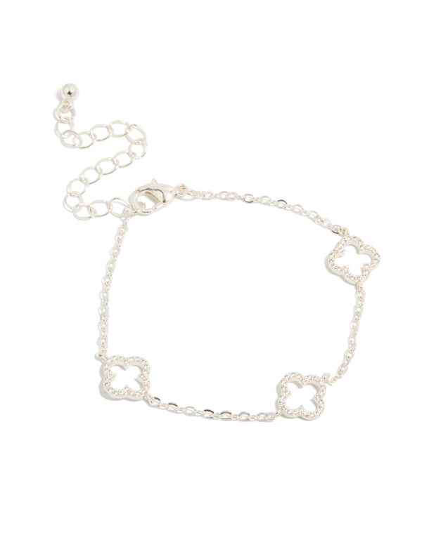 Crafted from silver plated material, this cubic zirconia outline flower bracelet front view