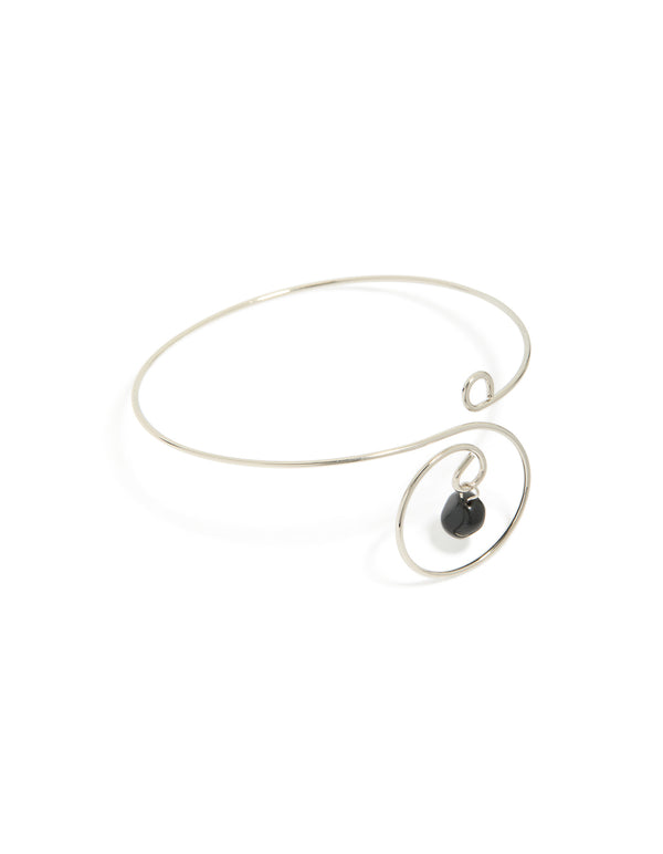 Showcasing a silver dainty swirl black semi precious stone arm cuff with beads and charm in a dainty design front view