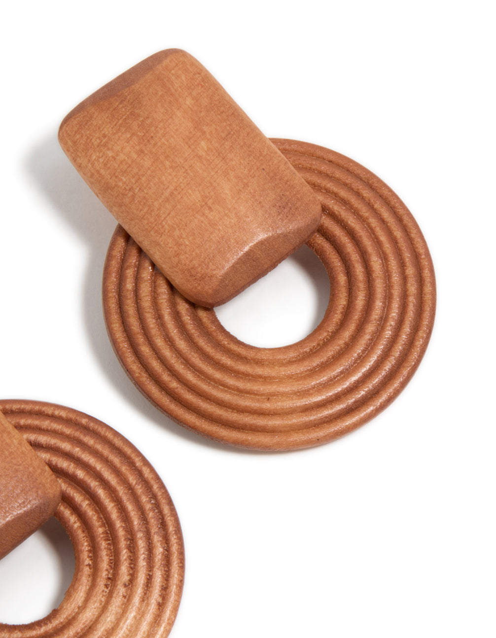 Crafted wooden textured circle drop earrings in tan and peru tones post detail view