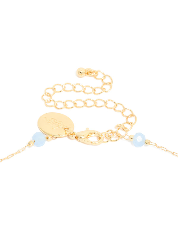 This gold plated blue beaded and evil eye pendant necklace with cubic zirconia in a statement style clasp detail view