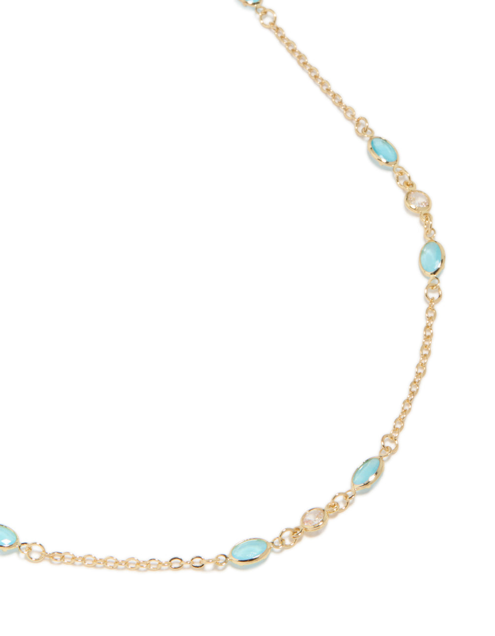 Showcasing a gold plated oval stone necklace with blue cubic zirconia featuring close up view