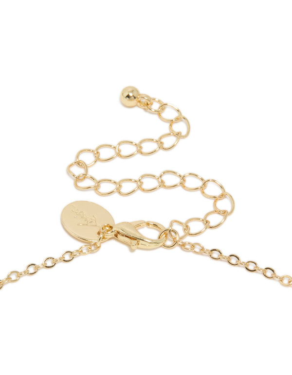 Highlighting the gold plated blue cubic zirconia oval stone necklace clasp detail view