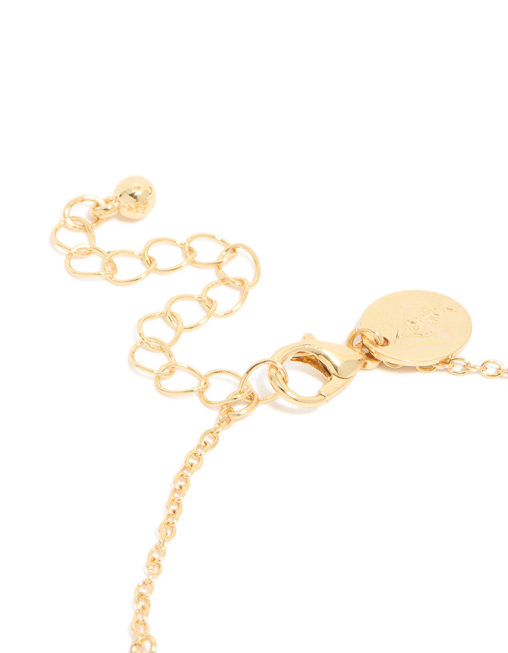 Showcasing gold plated cubic zirconia evil eye trio bracelet closure detail view