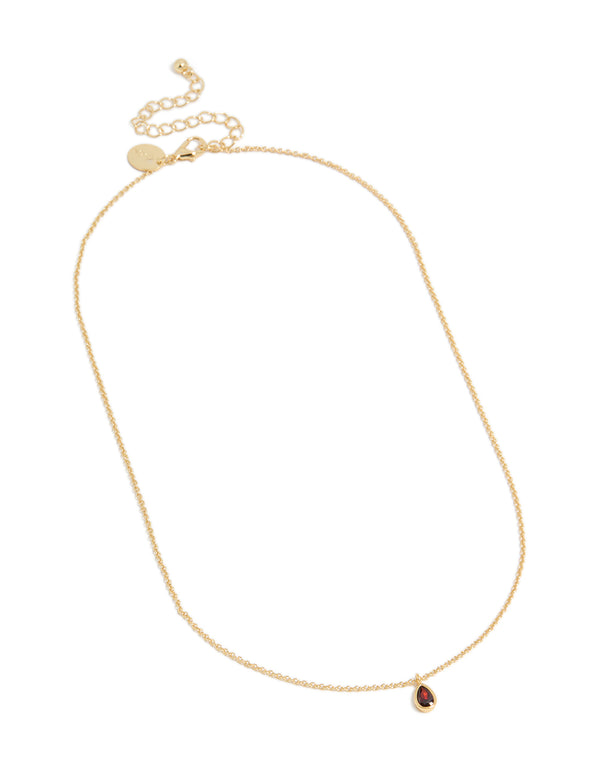 Discover a gold plated July birthstone necklace featuring a cubic zirconia pendant in a dainty statement style, front view