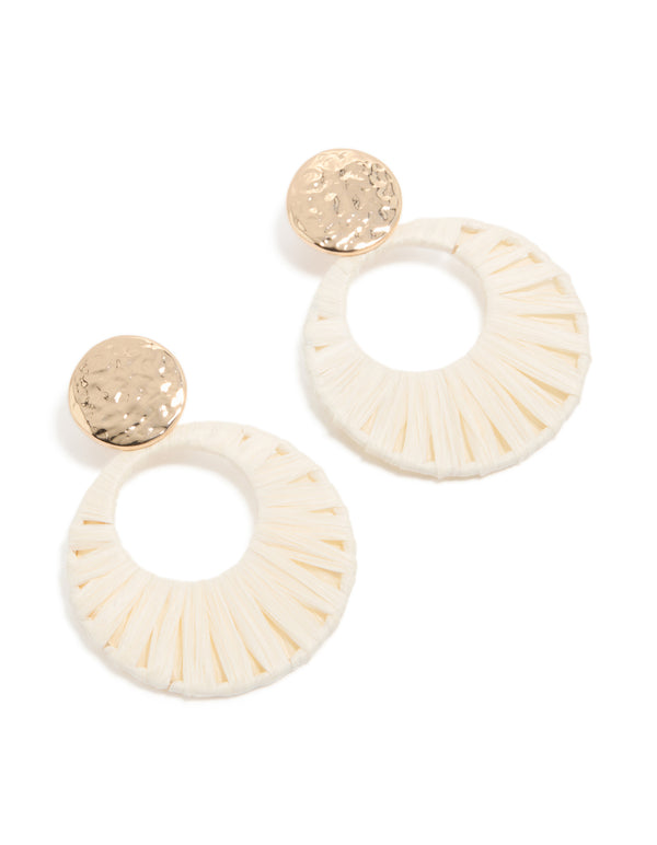 Showcasing statement drop earrings in gold with white raffia paper circle design front view