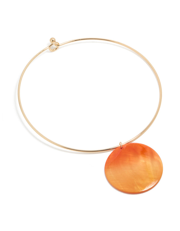 Crafted with gold orange genuine shell disc in a chunky torque necklace front view