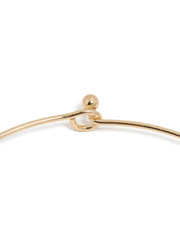 Designed with a gold orange genuine shell disc chunky torque necklace clasp detail view