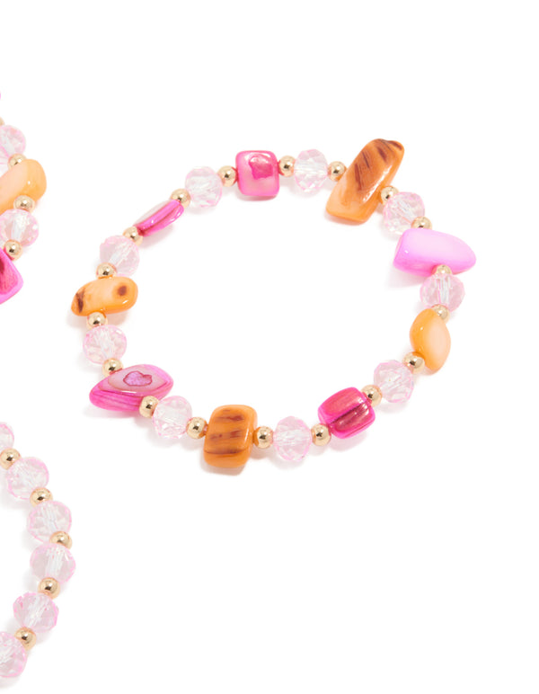Featuring beads in pink, brown and gold, this stretch bracelet in a 3-pack offers a close up view