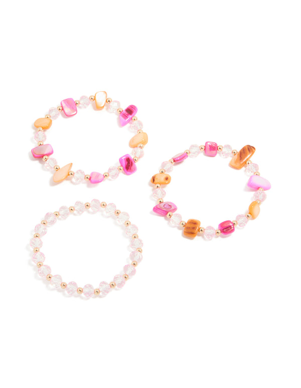 Explore this beaded stretch bracelet 3-pack featuring pink, brown and gold tones front view