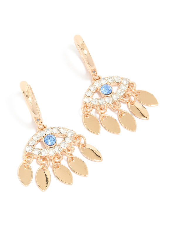 Featuring statement evil eye charm huggie earrings in gold front view