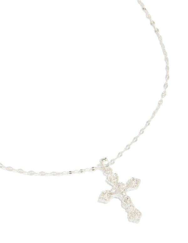 Showcasing a vintage cross charm pendant necklace crafted from silver plated material with statement styling close up view