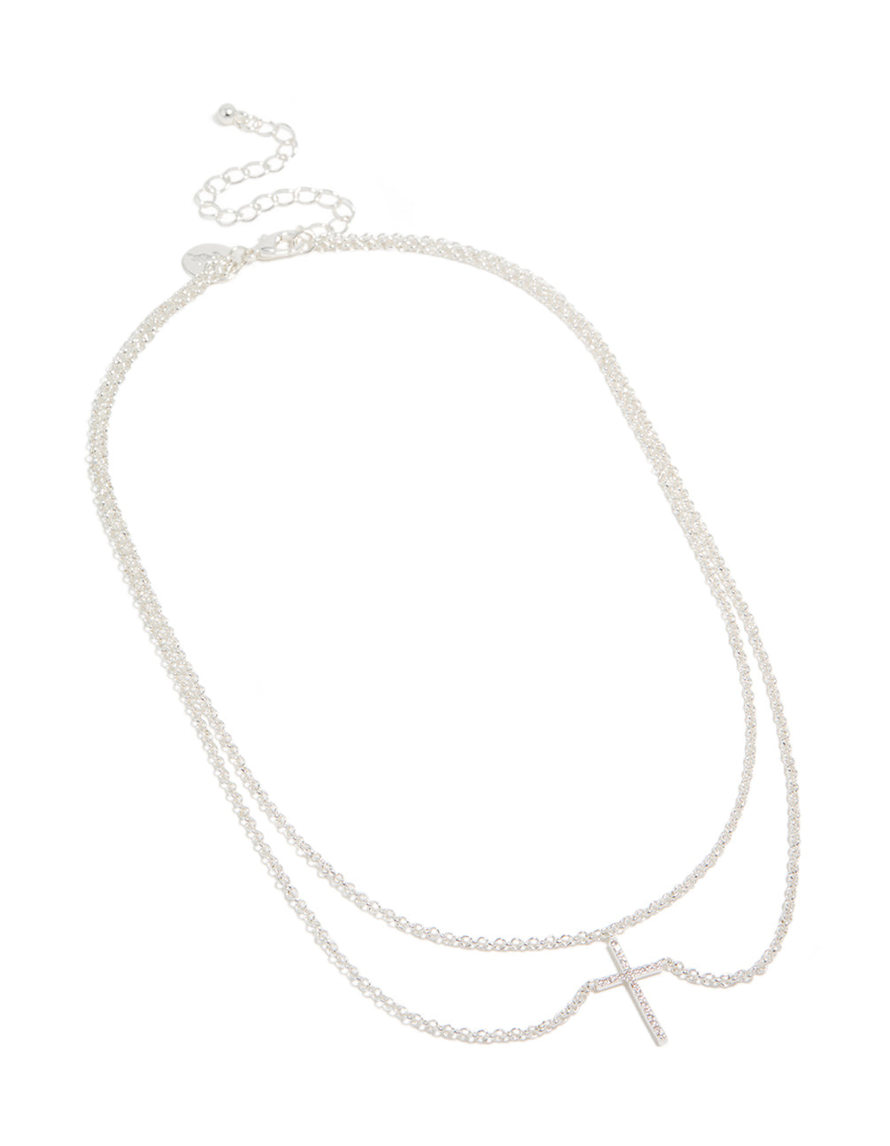 Featuring a silver plated layered necklace with cubic zirconia cross pendant close up view