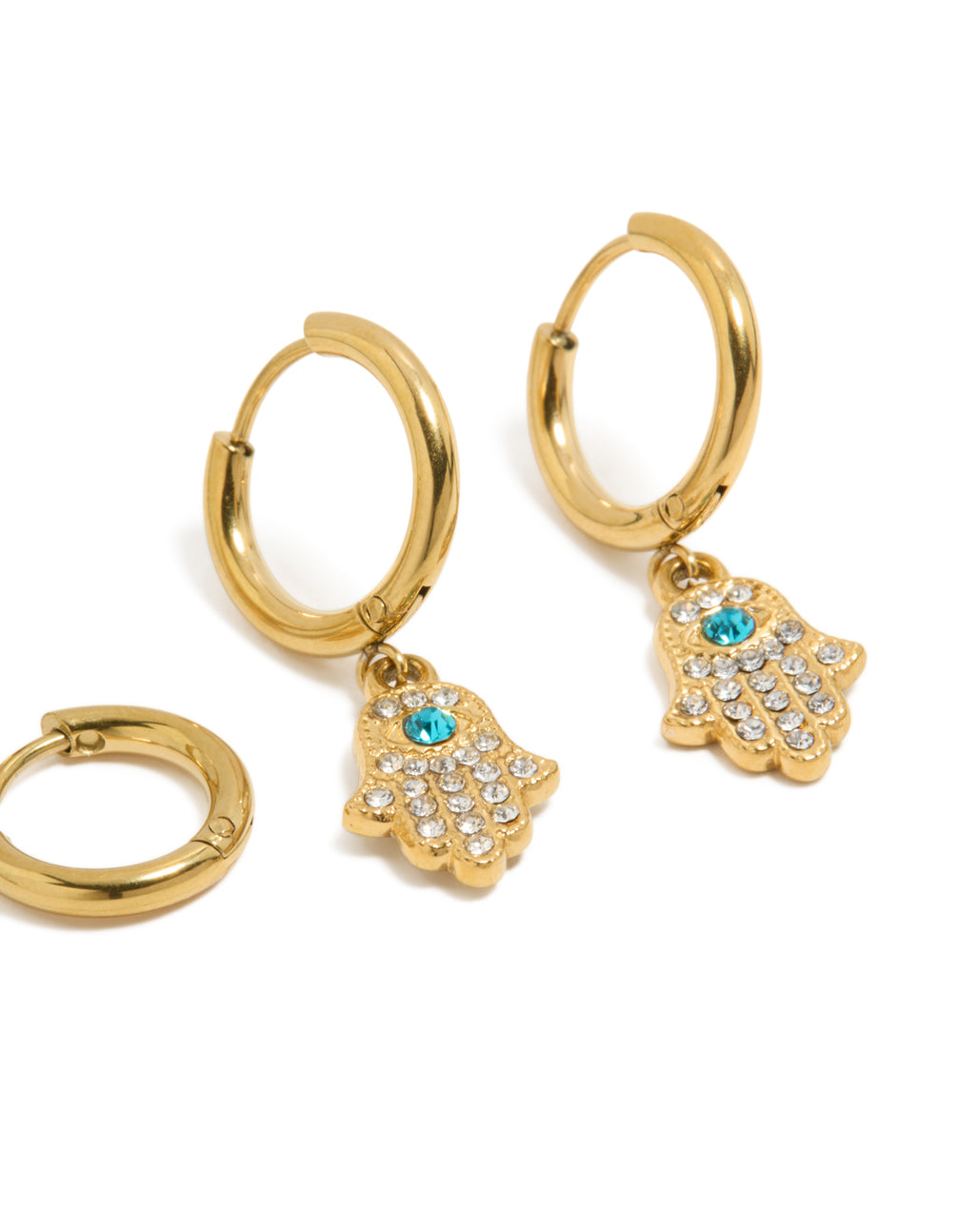 Designed with waterproof gold plated stainless steel evil eye hamsa hand diamante huggie earrings in a 2-pack with turquoise and clear accents close up view