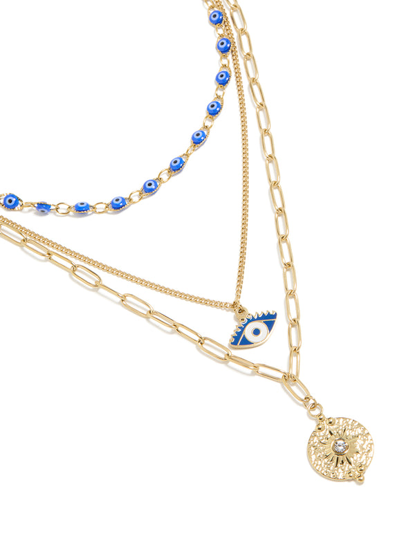 Showcasing waterproof gold plated stainless steel evil eye necklaces 3-pack featuring beads, celestial enamel in blue and white close up view
