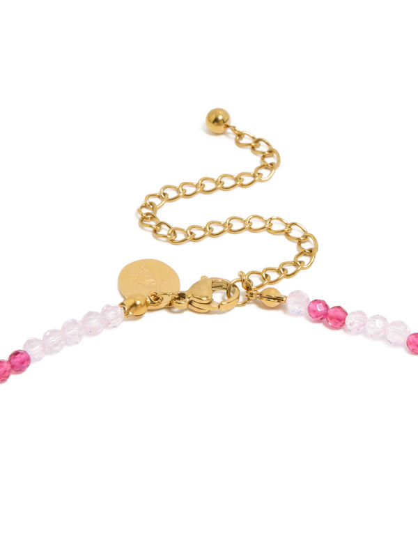 Presenting a waterproof beaded necklace with pearl, crafted from gold plated stainless steel in pink clasp detail view