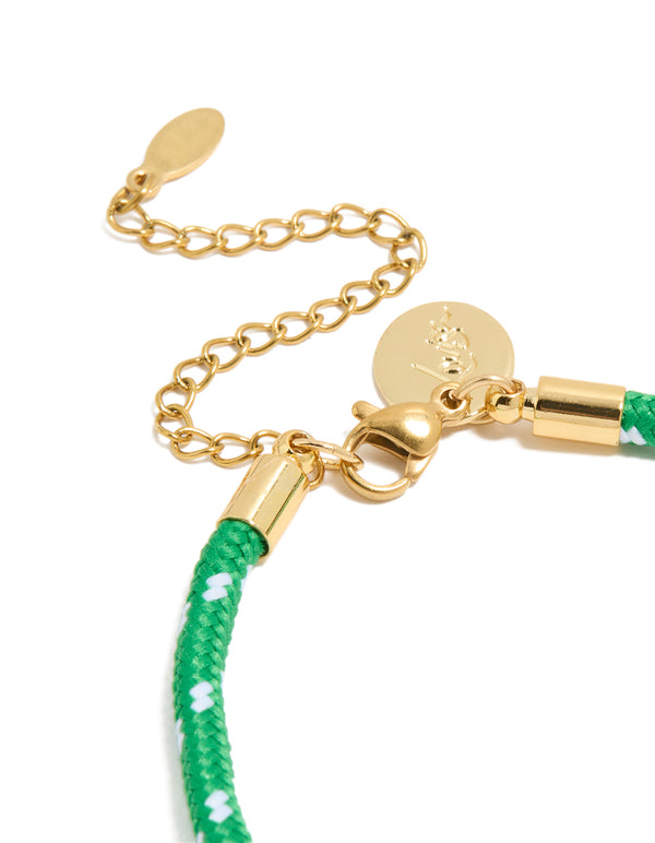 Highlighting waterproof gold plated stainless steel half tennis and half vibrant green cord bracelet with white accents in statement style closure detail view
